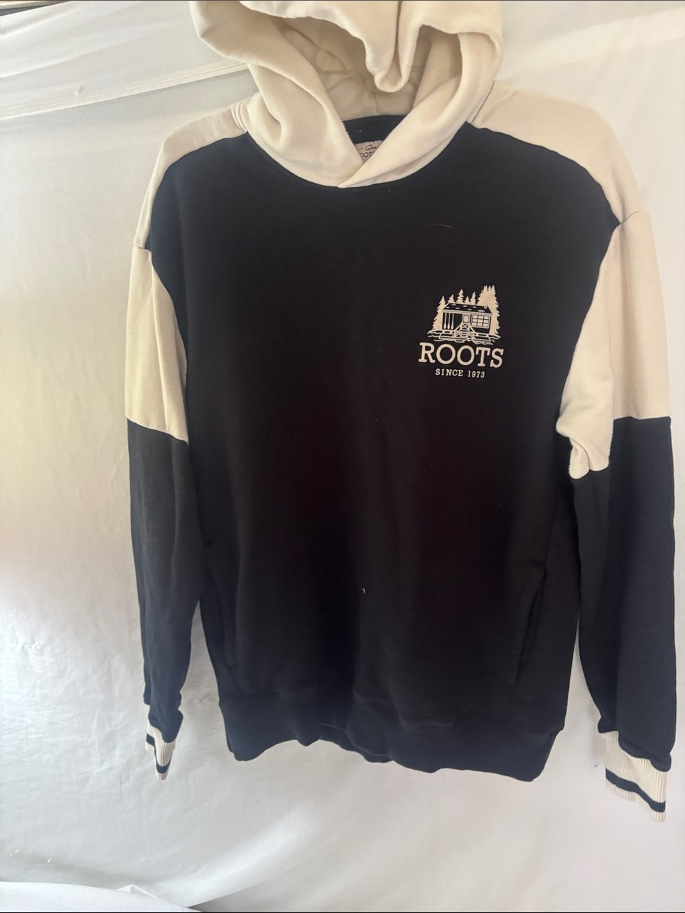 Roots Two-Tone Crewneck Hoodie in Black and Cream 50 Years.   80% cotton.